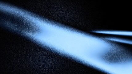 Fototapete - Vibrant Blue Glowing Shape Floating Over a Dramatic Dark Grainy Background with Noise Texture Creating a Cutting Edge and Stylish Visual Effect for a Modern Poster Design