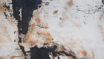 Leinwandbilder - background of a stone wall with a gray and white pattern. The wall looks like it is made of marble and has a rough texture. The photo creates a sense of depth and volume