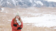 © LT - a girl travel to Kusasenri in winter and feel cold on the peak