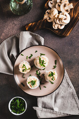 Wall Mural - Snack of mushrooms, funchose and fish caviar on a plate on the table top and vertical view