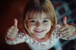 © Ева Поликарпова - A happy little girl giving a thumbs up sign, a positive and optimistic image for various uses