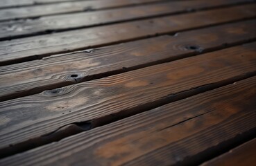 Closeup view of dark brown wooden plank surface. Horizontal planks tightly fitted together. Wooden texture shows natural wood grain, knots, slight irregularities. Creates rustic, vintage look