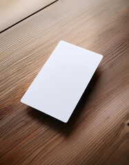 Poster - Blank Business Card Resting on Light Wooden Surface Waiting for Personalization and Creativity