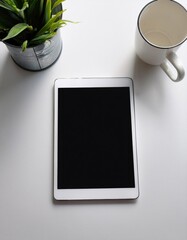 Aufkleber - Modern Technology Resting on a Minimalistic Workspace With Greenery and a Cup of Coffee