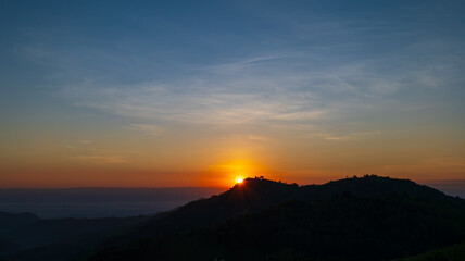 Poster - sunset sky on top of mountain and valleys. Natural landscape