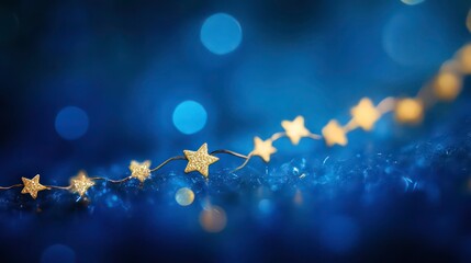 Sticker - tiny gold stars forming a delicate wave on a vibrant blue bokeh gradient.