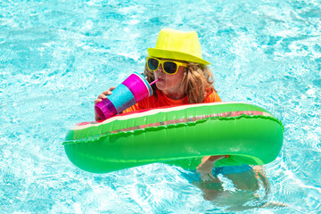 Wall Mural - Children playing in the swimming pool. Summer activity.