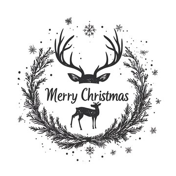 a black and white image of a deer head and a wreath.