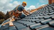 © Mechastock - A roofer working on the roof repair of a home