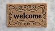 © Fenny - Welcome mat on textured floor, home entrance