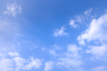 Wall Mural - clean air daytime bright blue sky and clouds.view of blue sky with shining sun. white fluffy clouds 