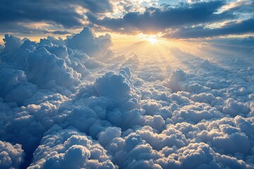 Poster - Stunning cloudscape with sunlight breaking through, creating vibrant rays of light and a serene atmosphere.