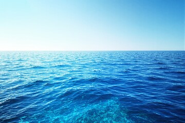 Aufkleber - Tranquil ocean waves under bright blue sky, clear horizon in serene daylight background.