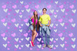 © deagreez - Photo of confident friends couple posing together wear denim pin-up outfit isolated violet color background