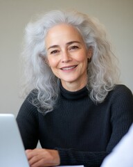Poster - Silver-Haired Professional Woman in Modern Office Setting Embracing Diversity and Experience in Workforce Development for Enhanced Corporate Innovation