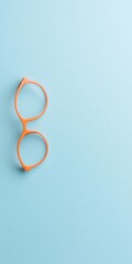 Poster - Minimalist Workspace Vibrant Orange Glasses on Pastel Blue Background - Contemporary Design for Creative Industries and Visual Content Strategies