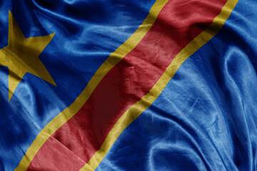 Wall Mural - shine waving colourful realistic national flag of democratic republic of the congo . macro shot