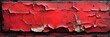 © Pascal - A background of bold red paint flaking off an old brick wall.