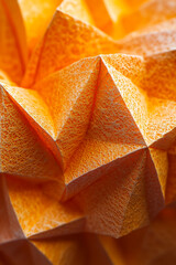 Poster - Close-up of intricately crumpled orange paper with sharp folds and creases, texture and detail