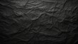 © Nice Seven - Textured Black Paper Background with Visible Wrinkles for Creative Design Projects and Artistic Applications