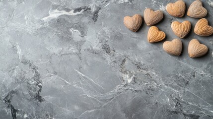 Aufkleber - Heart shaped almonds arranged on gray stone background with ample copy space for text elegant and contemporary food presentation