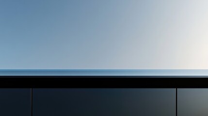 Poster - Black glass building wall detail under clear sky with ample space for text or branding in modern architectural context