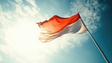 Poster - Vibrant flag waving against a bright sky showcasing empty space for text and promotional content