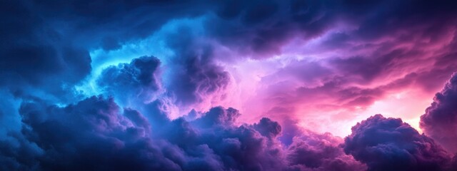 Poster - moody night sky with dramatic blue, purple, and pink clouds creating a vivid backdrop, ideal for tex