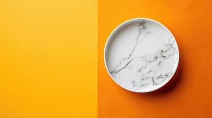 Poster - orange and white marble plate on vibrant background with empty copy space for creative text or displ