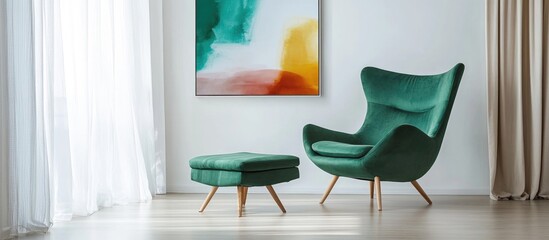 Poster - Stylish green lounge chair and ottoman beside vibrant abstract art in bright, airy room with natural light and ample empty space for text.