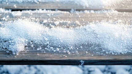 Poster - Frozen wooden surface blanketed in snow with ample space for text and graphics, ideal for winter themed compositions and advertisements