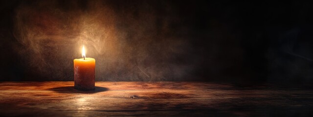 Poster - Candle casting warm light in a dark atmospheric setting with ample space for text or design elements.