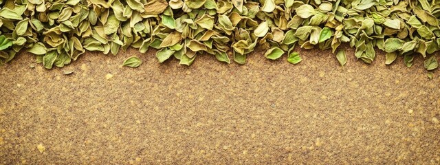 Fototapete - Dried oregano leaves on textured surface with scattered bits creating ample space for text or culinary marketing designs