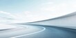 © CryptoCanvas - Modern minimalist curved road with clear sky and smooth surface ideal for adding directional sign or text for travel or navigation concepts