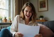 © StockHeroes - Young woman excitedly reading university acceptance letter