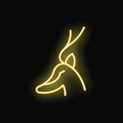 Poster - Yellow neon sign of a deer head on a black background, glowing brightly