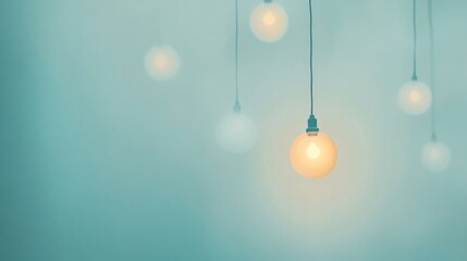 Poster - Hanging light bulbs gently illuminate a calm light blue backdrop, creating a peaceful ambiance. This minimalist setup invites relaxation and reflection during twilight