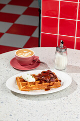 Wall Mural - Portion of fresh waffle with beef brisket and cream cheese with coffee