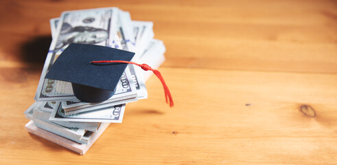 Poster - graduation cap with money.