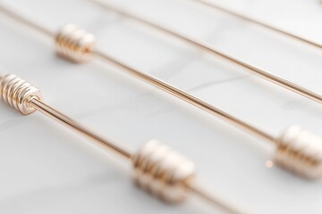 Poster - Glowing guitar strings stretch across a smooth gradient from white to gray. The delicate metallic tones of gold and silver create an elegant visual, enhancing the sleek design