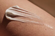 © Marevgenna - White body cream on dry human skin.