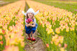 © famveldman - Dutch children in tulip field