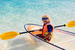© famveldman - Kids kayaking in ocean. Family in kayak in tropical sea
