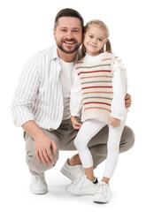 Wall Mural - Happy father with his cute little daughter on white background