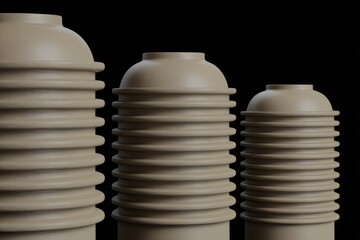 Poster - three ceramic cylindrical vases with a layered design.