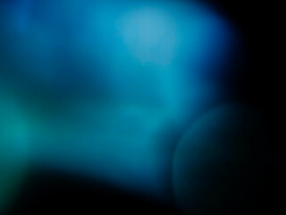 Wall Mural - colorful light leak on dark background. cinematic visual lens effect for design and creative ideas. 