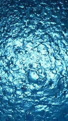 Aufkleber - Super Slow Motion of Water Drops in Detail. Filmed on High Speed Cinema Camera, 1000 fps. Texture of Water in Pool, Shot from Above. Vertical Aspect Ratio.