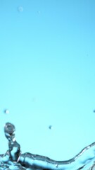 Fototapete - Super Slow Motion of Water Drops Falling Down in Extreme Detail. Filmed on High Speed Cinema Camera, 1000fps. Vertical Aspect Ratio.