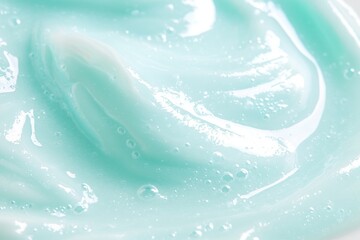 Poster - Smoothing turquoise cosmetic cream gel forms a captivating swirling pattern with delicate bubbles, creating an ideal backdrop for beauty product concepts and skincare themes