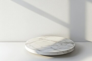 Poster - Round marble podium resting on a white surface, illuminated by soft window light that casts delicate shadows on the wall, creating an elegant backdrop for product displays